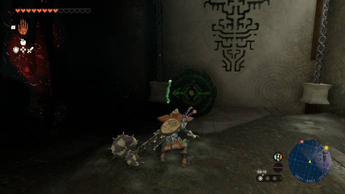 Link attaches a wheel to a chain on a door to open it in The Legend of Zelda: Tears of the Kingdom