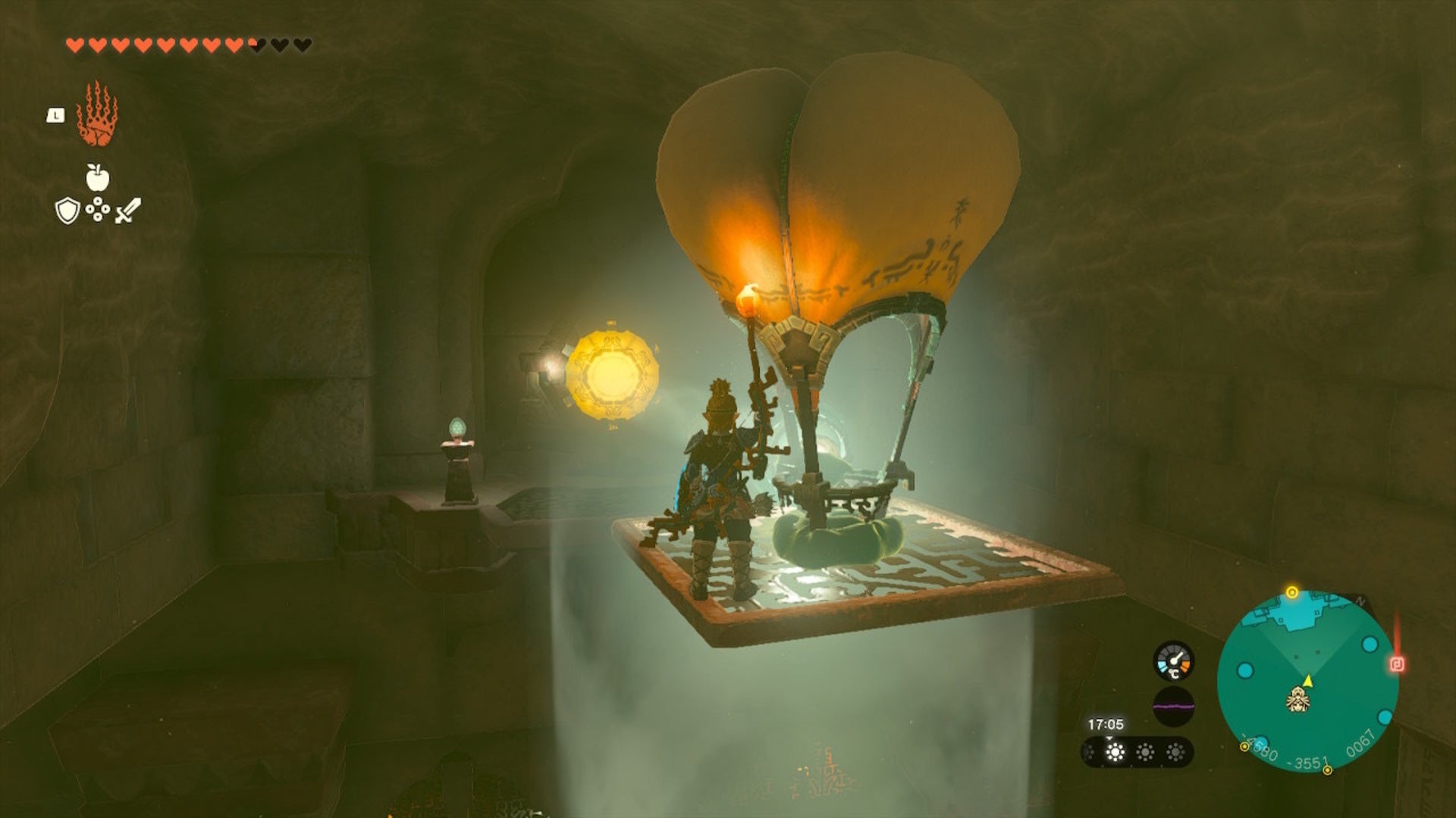 Link rides a hot air balloon with a mirror on it in The Legend of Zelda: Tears of the Kingdom