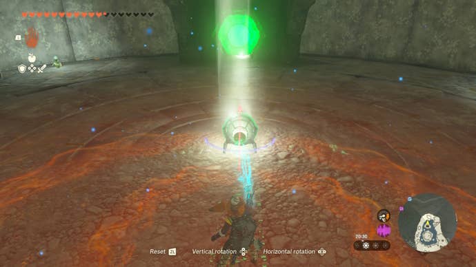 Link points a mirror towards a panel on Lightcast Island in Zelda: Tears of the Kingdom