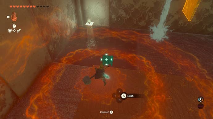 Link grabs a chest from underwater using Ultrahand in The Legend of Zelda: Tears of the Kingdom