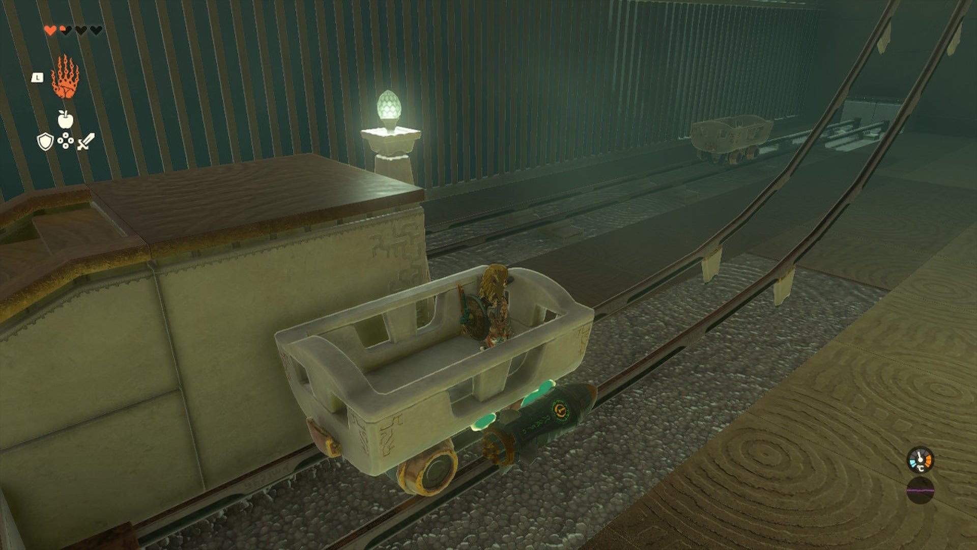 Link attaches two missiles to a minecart in the Oromuwak Shrine in Zelda: Tears of the Kingdom - 6