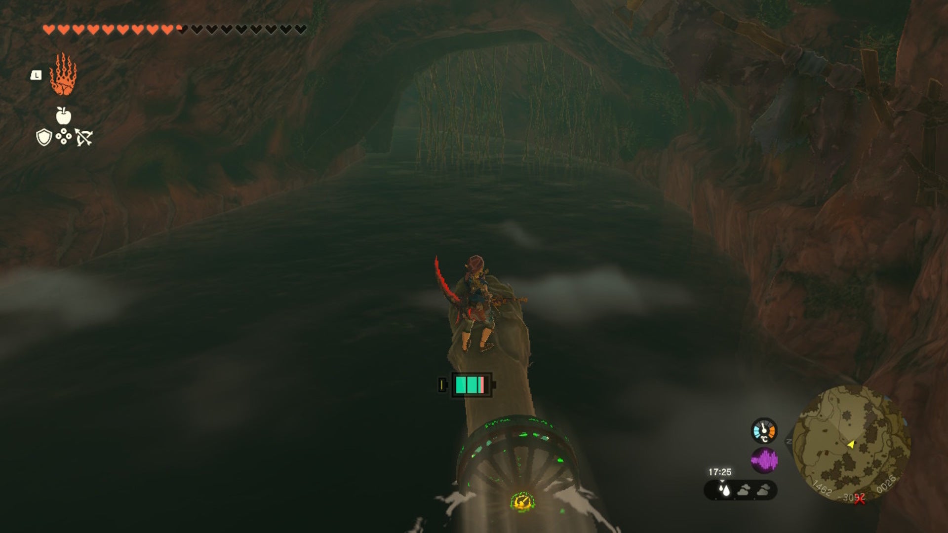 Link rides a raft made from a log and fan through the Sarjon Cave in The Legend of Zelda: Tears of the Kingdom - 6