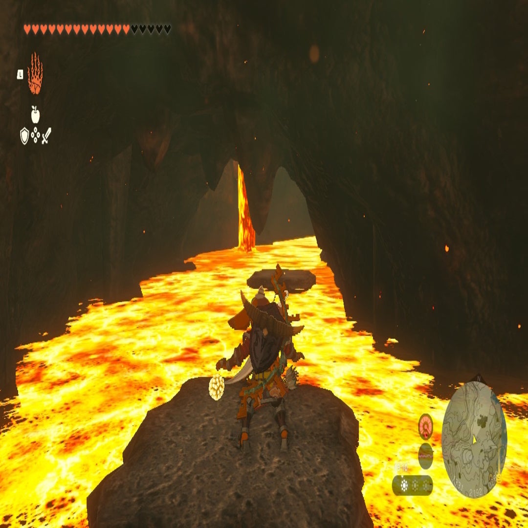 Link rides a stone block across some lava in The Legend of Zelda: Tears of the Kingdom