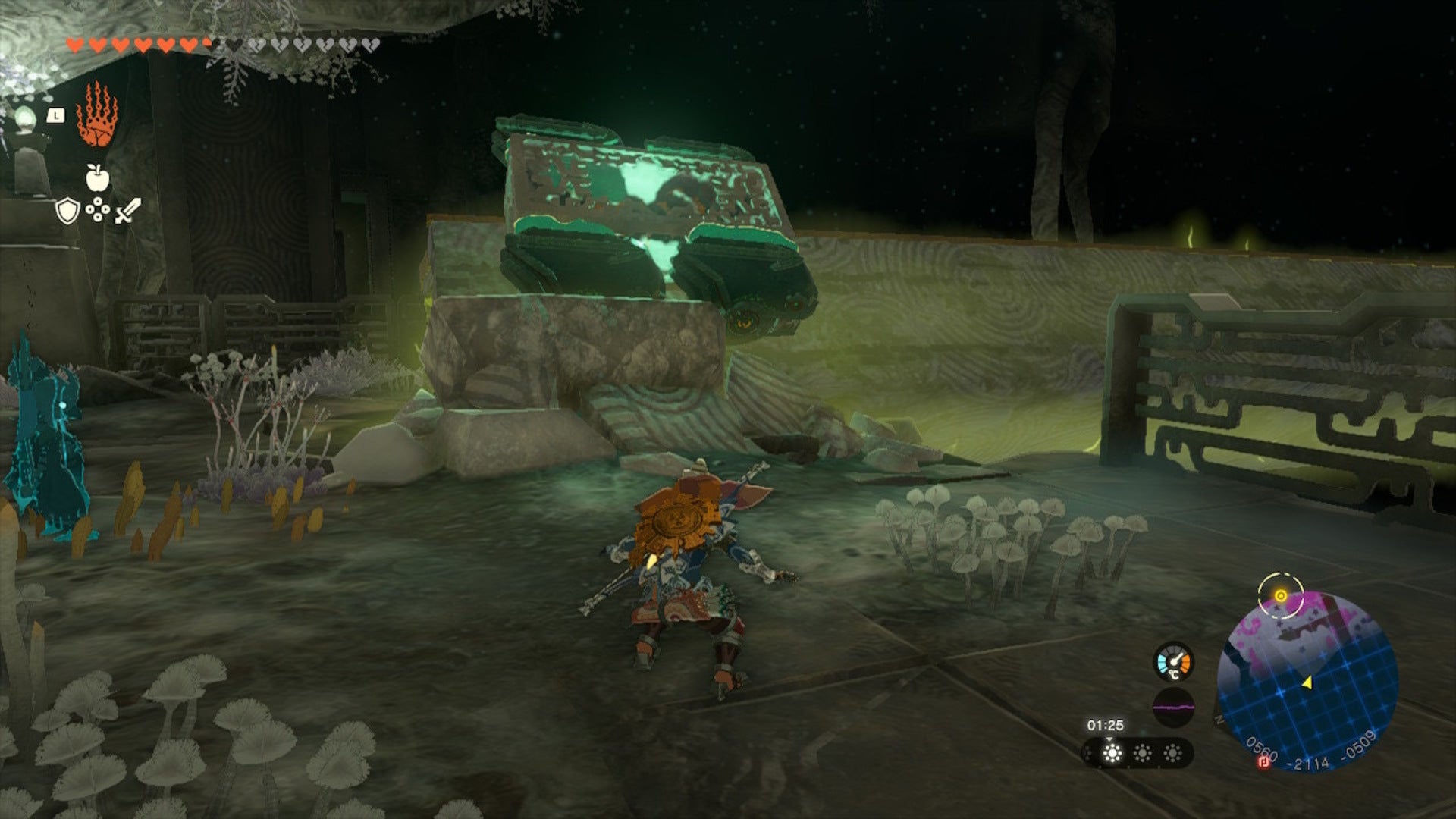 Link looks up at a car made of wheels and a relic in The Legend of Zelda: Tears of the Kingdom - 5