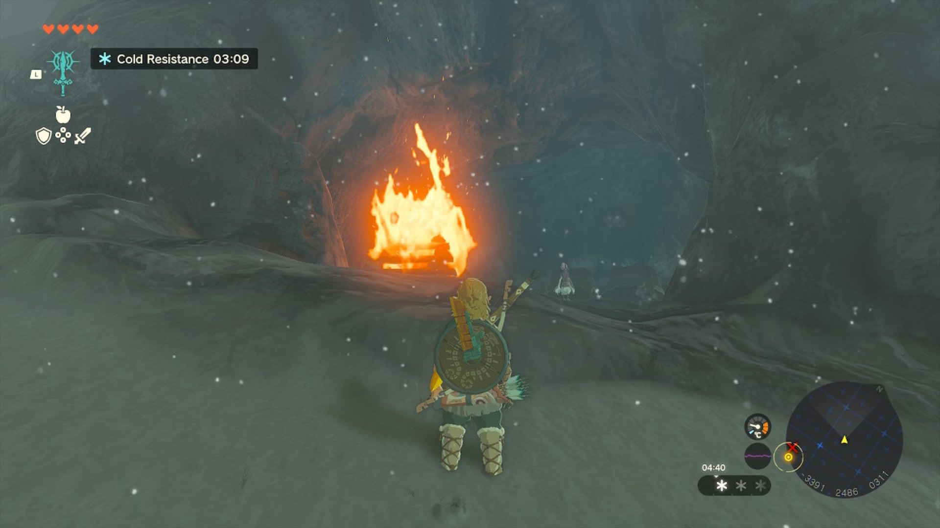 Link faces the entrance to Hebra South Summit Cave in The Legend of Zelda: Tears of the Kingdom | Nintendo - 9