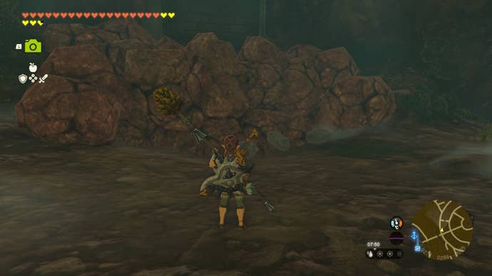 Link faces a large pile of breakable rocks in a cave in The Legend of Zelda: Tears of the Kingdom