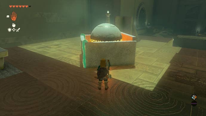 Link places a ball in a box in the Runakit Shrine in The Legend of Zelda: Tears of the Kingdom