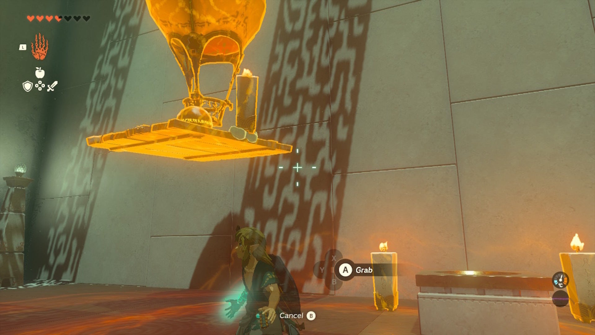 Link uses a platform and hot air balloon to send a small ball upwards in the Sinakawak Shrine in The Legend of Zelda: Tears of the Kingdom