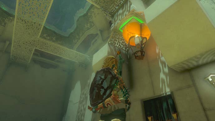 Link uses a hot air balloon to press a button in the Sinakawak Shrine in The Legend of Zelda: Tears of the Kingdom