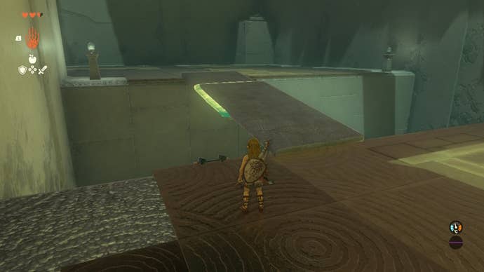 Link uses the Ultrahand ability to attach two planks together and form a bridge in the Ukouh Shrine of The Legend of Zelda: Tears of the Kingdom