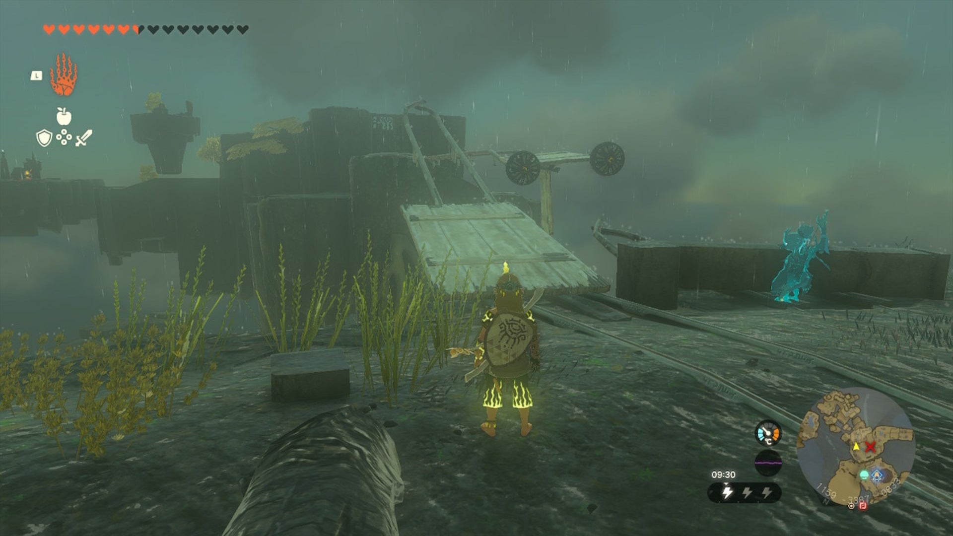 Link looks over at two wooden carts on rail tracks in The Legend of Zelda: Tears of the Kingdom - 12