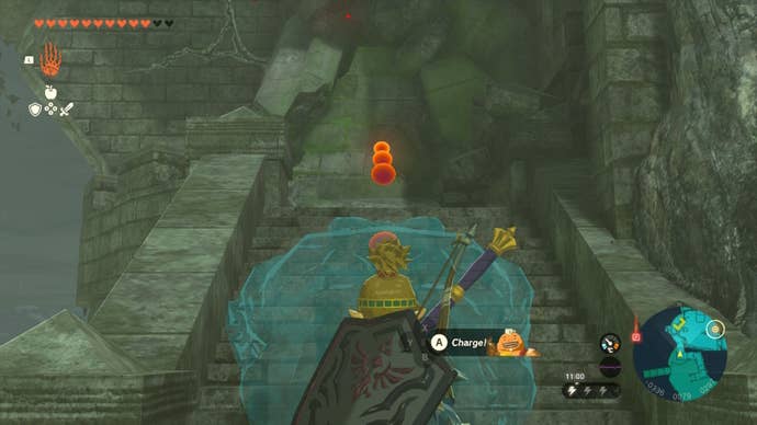 Link aims Yunobo at a blockade in front of Zelda's room in 
The Legend of Zelda: Tears of the Kingdom