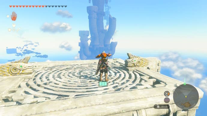 Link stand atop a floating platform facing the Zonaite Forge Island in Zelda: Tears of the Kingdom