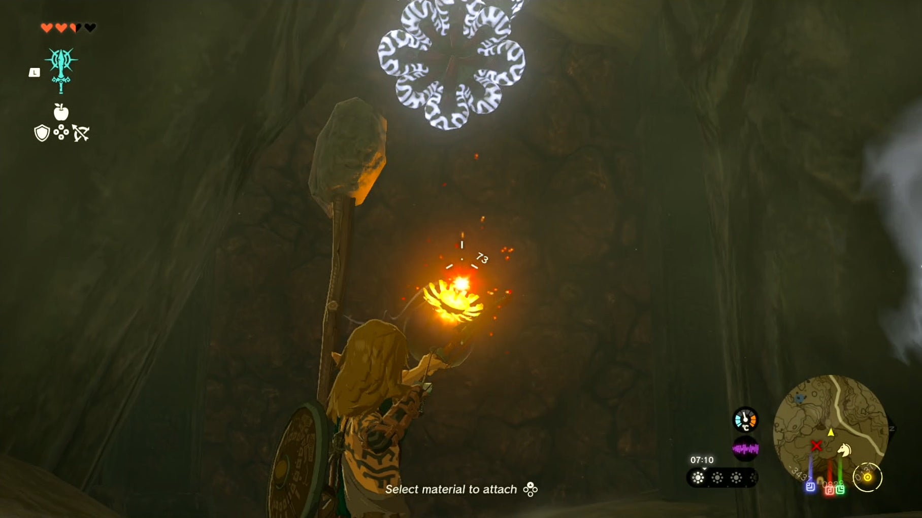 Link drawing a bomb arrow with his bow in the Tanagar Canyon West Cave in The Legend of Zelda: Tears of the Kingdom.