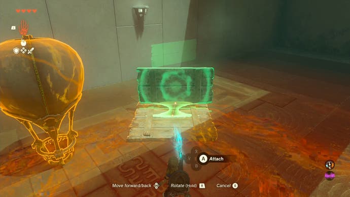 Link joining pieces of wood together at the Sinakawak Shrine using the Ultrahand ability, as the player tries to create a makeshift hot air balloon.