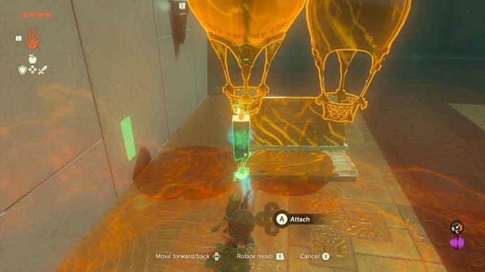 Link adding a large candle to a makeshift hot air balloon in the Sinakawak Shrine.