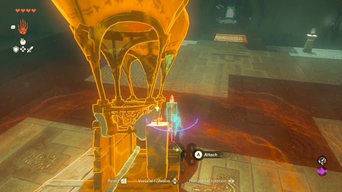 Link adding a second large candle to a makeshift hot air balloon in the Sinakawak Shrine. This is the final step before players can travel on it.
