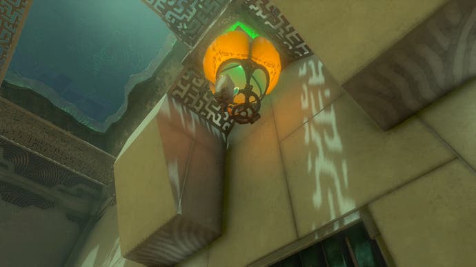 A hot air balloon floats towards a switch in the Sinakawak Shrine and hits it. The switch flashes green as it gets activated.