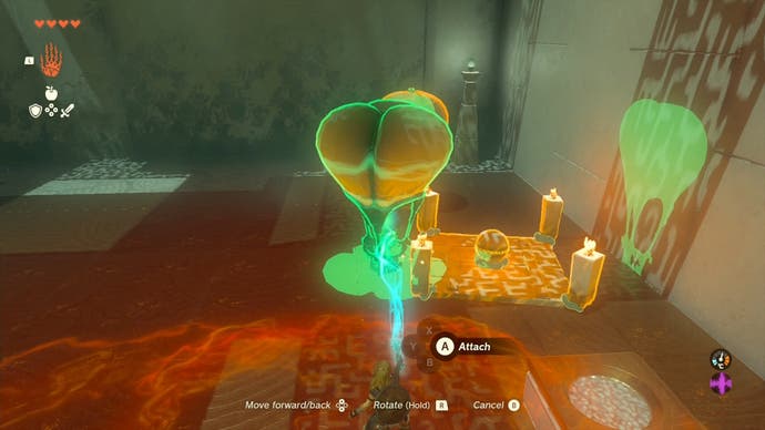 Link using the Ultrahand ability to attach balloons to a square piece of wood which has candles on each corner, and a metal ball in the middle.