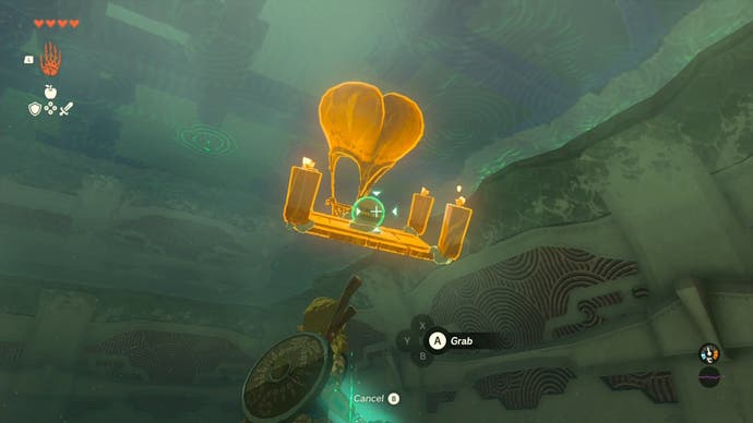 Link watching as a makeshift hot air balloon he created in the Sinakawak Shrine floats in the air.
