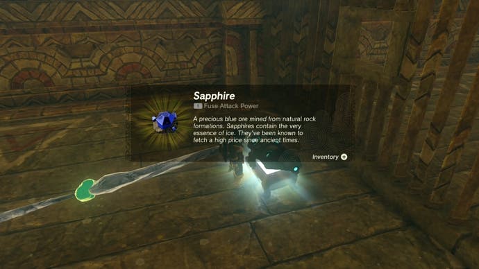 Link getting a Sapphire ore from a treasure chest in the Wind Temple.