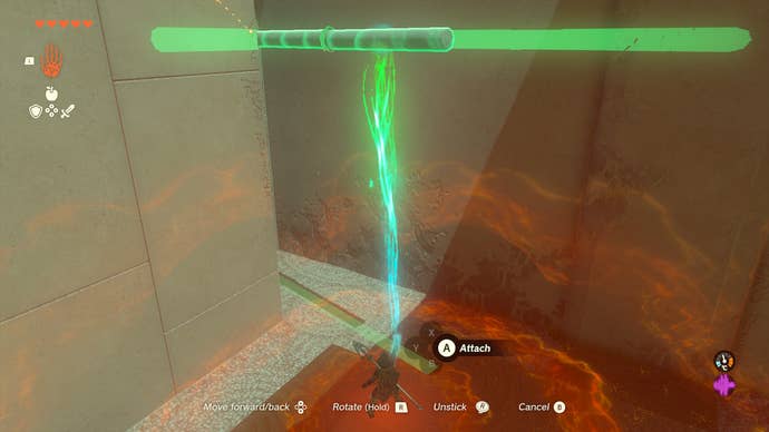 Link using his Ultrahand ability to reach a faraway chest with two stone pillars that have been attached together.