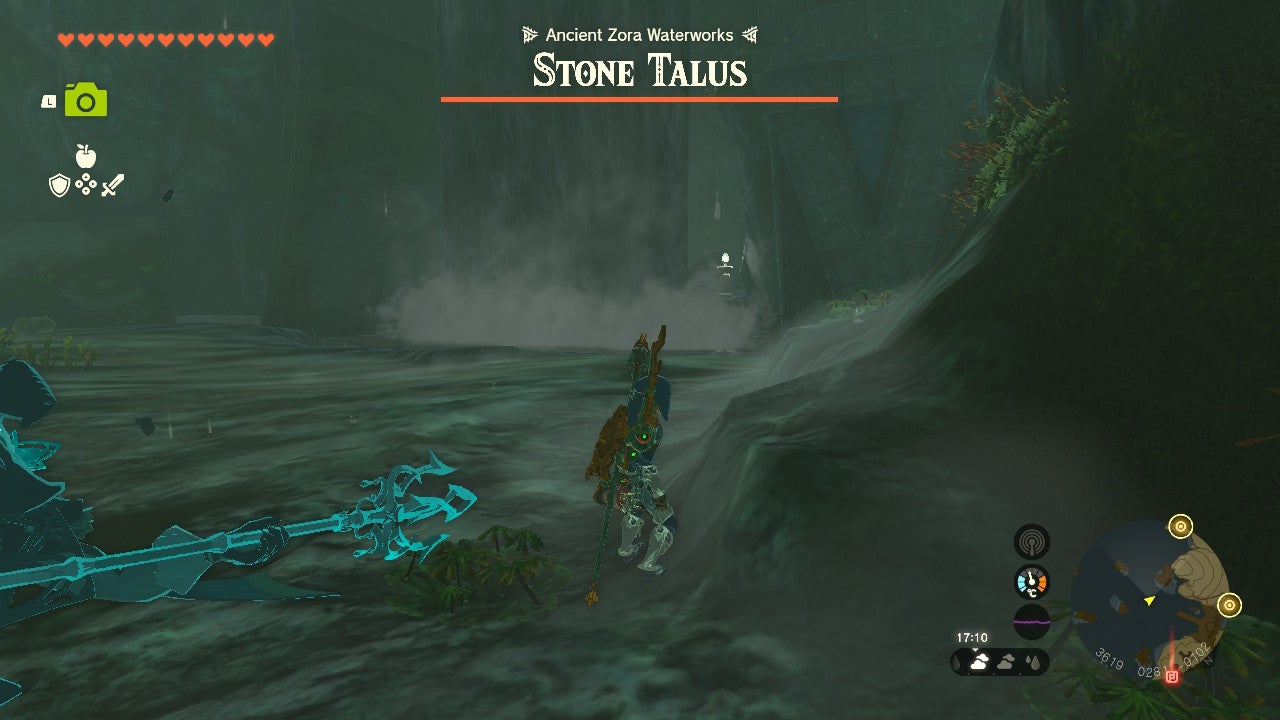 Link fighting a Stone Talus enemy at the Ancient Zora Waterworks.