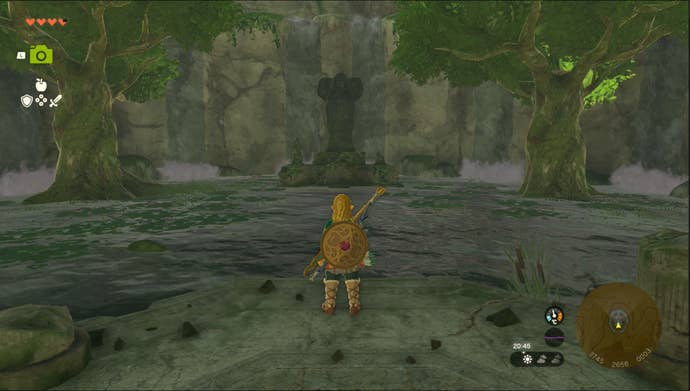 Link standing by the Spring of Power Goddess Statue in the Ulri Mountain region in Zelda: Tears of the Kingdom.