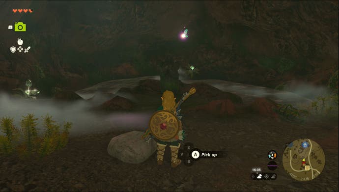 Link standing by the East Akkala Stable Well Goddess Statue in the Ulri Mountain region in Zelda: Tears of the Kingdom.