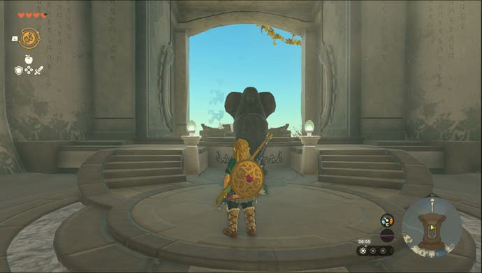 Link standing by the Temple of Time Goddess Statue on the Great Sky Island in Zelda: Tears of the Kingdom.
