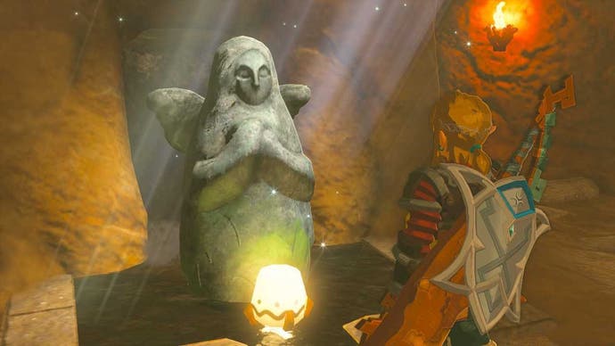 Link standing by the Gerudo Town Goddess Statue in the Gerudo Canyon region in Zelda: Tears of the Kingdom.
