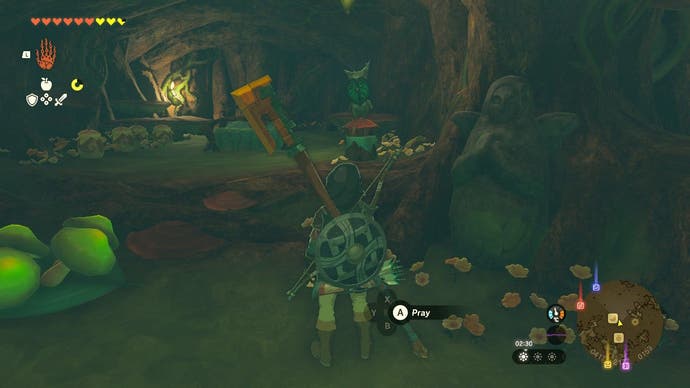 Link standing by the Korok Forest Goddess Statue in the Thyphlo Ruins region in Zelda: Tears of the Kingdom.