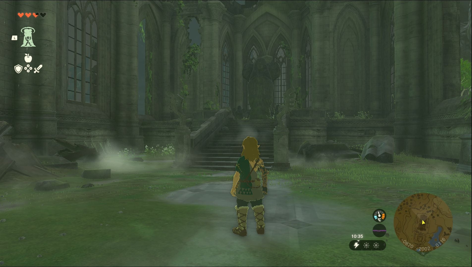Link standing near the Grand Plateau Goddess Statue location in the Hyrule Field region in Zelda: Tears of the Kingdom.