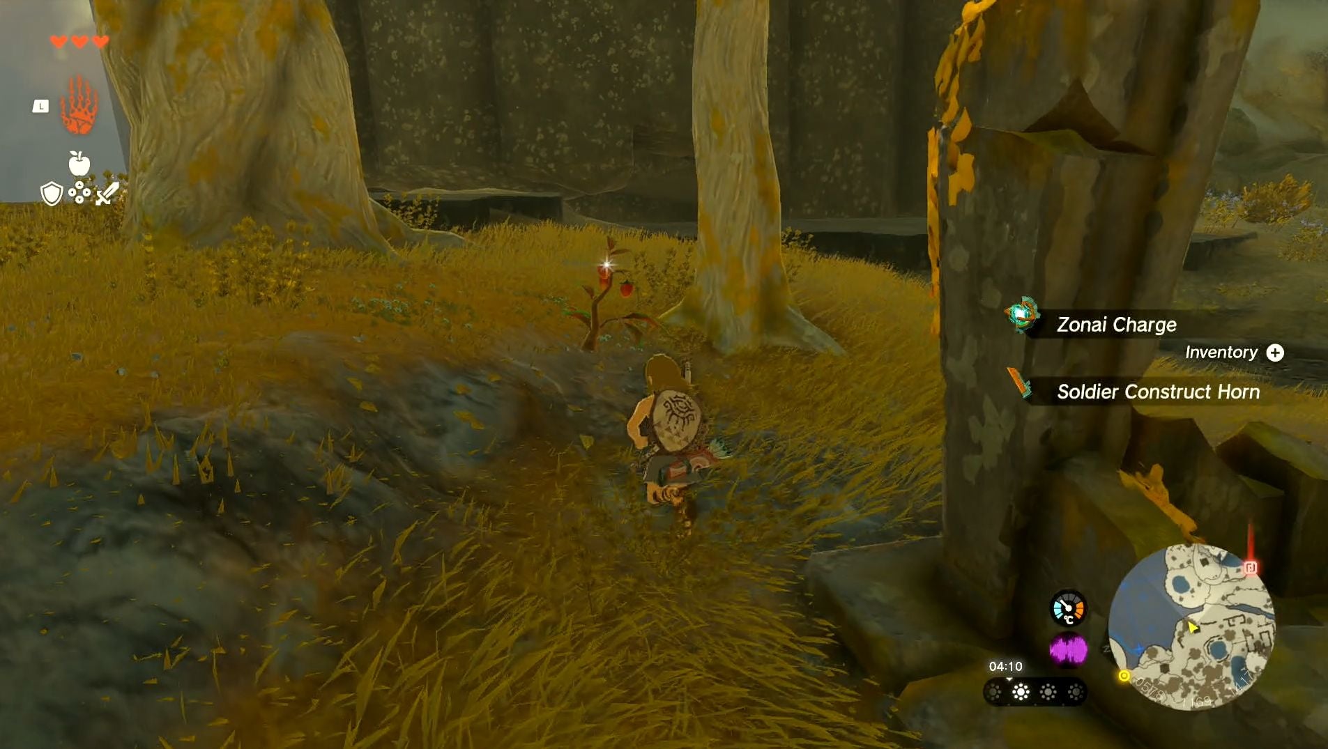 Image showing Link approaching a bush where players on their way to the Gutanbac Shrine can collect Spicy Peppers in The Legend of Zelda: Tears of the Kingdom.