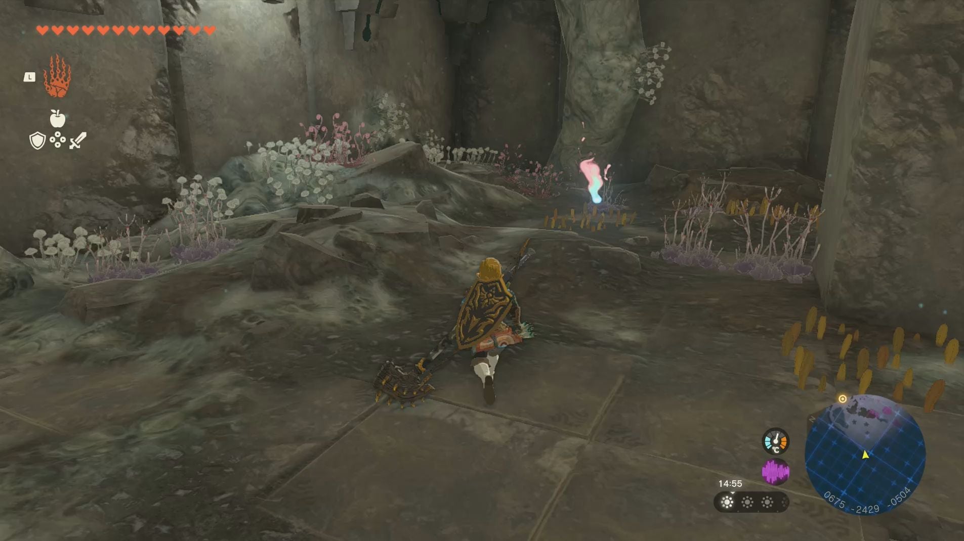 Link approaching a Grand Poe in the Left-Arm Depot in The Legend of Zelda: Tears of the Kingdom.