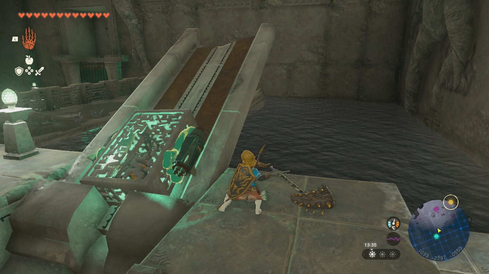 Link placing the Construct&rsquo;s left-leg on a stone slab that&rsquo;s at an angle in the Left-Leg Depot in Zelda: Tears of the Kingdom.