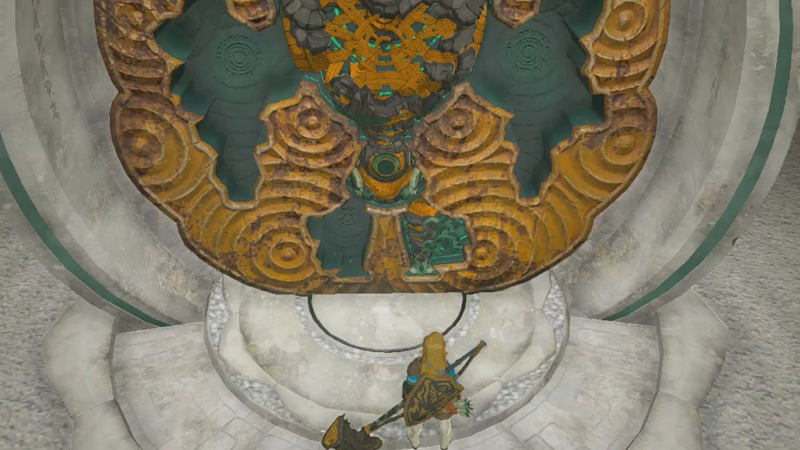 Link standing by the Construct&rsquo;s left-leg at the Construct Factory in The Legend of Zelda: Tears of the Kingdom.