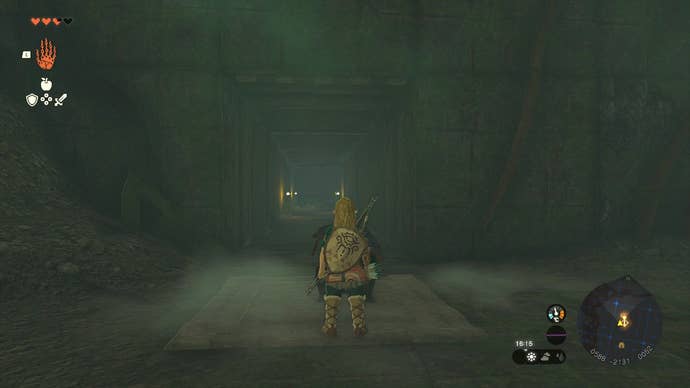 Link standing in the Popla Foothills Excavation Site cave in The Legend of Zelda: Tears of the Kingdom.