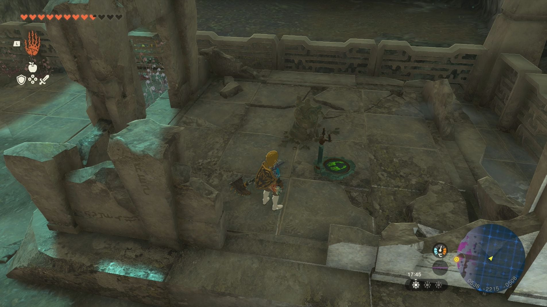 Link standing near a Steering Stick that&rsquo;s located outside the Right-Arm Depot in Tears of the Kingdom.