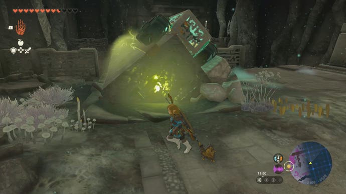 Link using an electrified pillar to transport the Construct's right-arm, which has wheels attached to it.