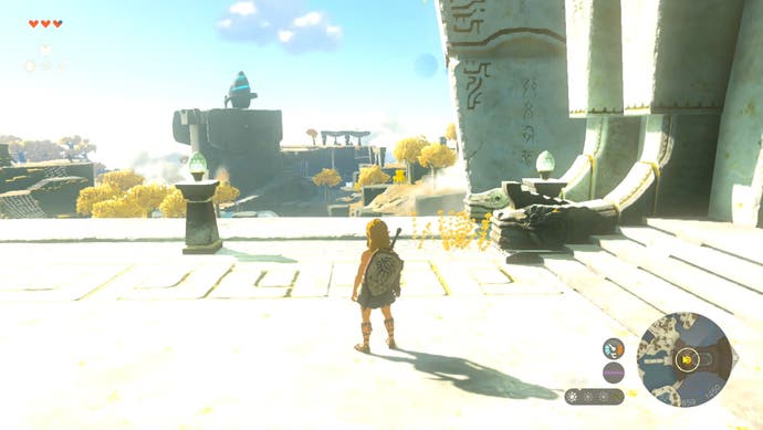 The Ukouh Shrine seen in the distance as Link stands near the Temple of Time in The Legend of Zelda: Tears of the Kingdom.