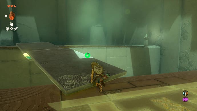 Link placing two large slabs over a gap in the Ukouh Shrine so he can cross it.