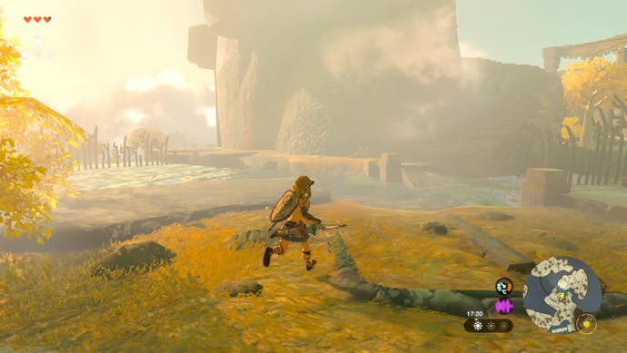 Link passes through an area with golden coloured grass as he journeys towards the Ukouh Shrine in The Legend of Zelda: Tears of Kingdom.