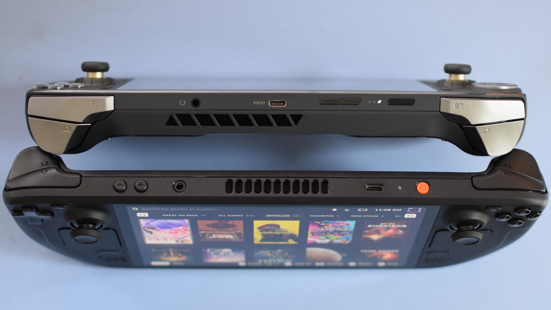 A Zotac Zone next to a Steam Deck OLED, showing their comparative thickness. - 6