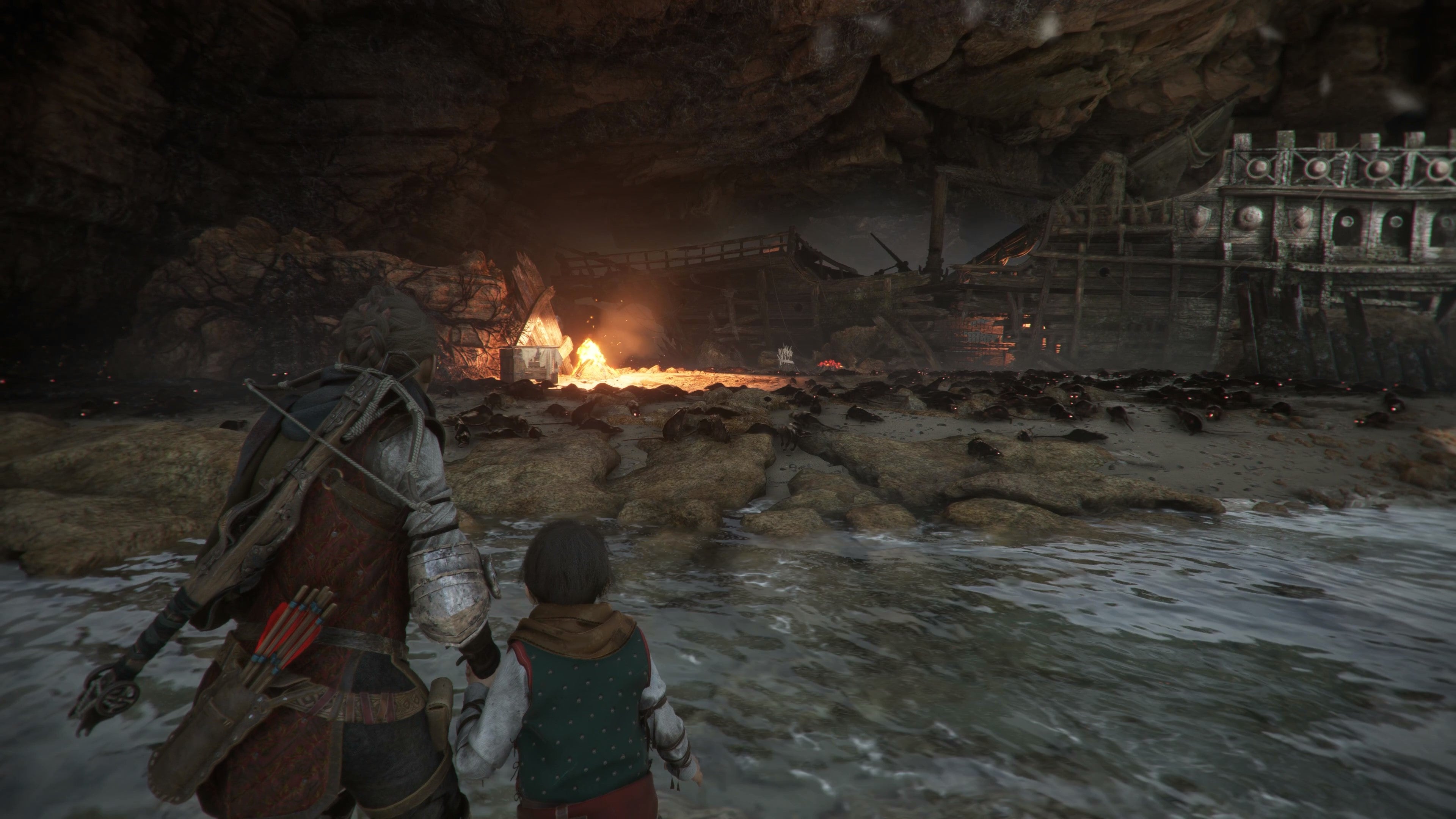 A young woman and her even younger brother stand facing a shipwreck surrounded by black rats.
