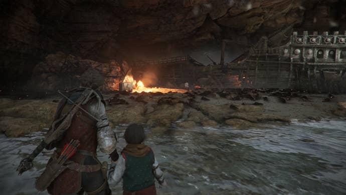 A young woman and her even younger brother stand facing a shipwreck surrounded by black rats.