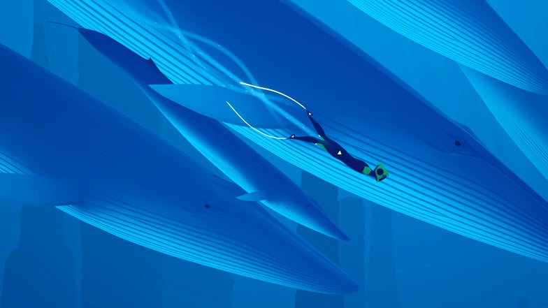 A screenshot from the underwater game Abzu, where a slight diver swims along with blue whales. There's a slightly simplified, illustrative look to the world.
