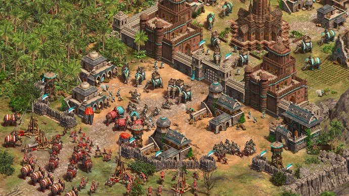 A screenshot of Age Of Empires II: Definite Edition’s Dynasties Of India DLC showing elephants in red and blue facing off.