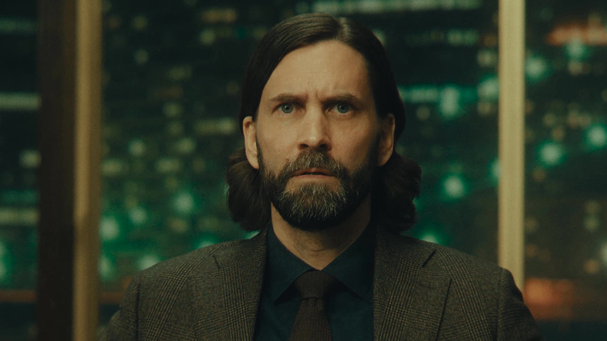 A live action still of Alan Wake from Alan Wake 2 - 1