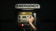 Ripley's places a keycard into a machine marked "Emergency" to save the game.